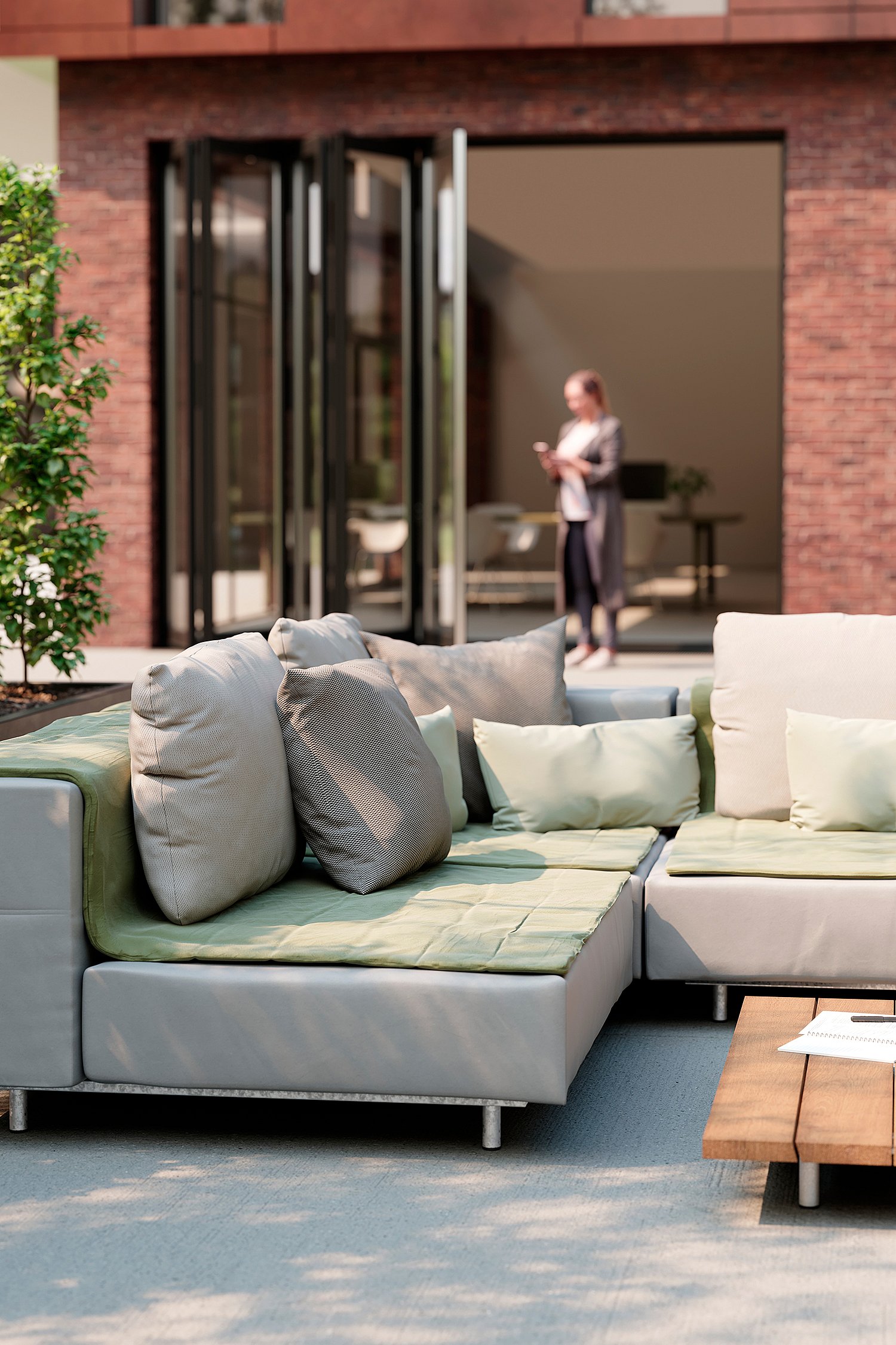 Comfortabele Walrus-buitenbank op een terras, een ontspannen plek voor informele gesprekken of pauzes tijdens de werkdag.