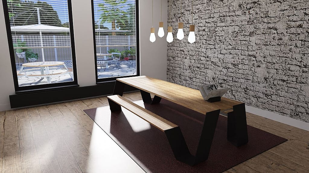 Scène d'intérieur rendue dans pCon montrant une table de pique-nique Extremis Hopperpicnic en bois, avec des pieds noirs inclinés, placée sur un tapis près de hautes fenêtres et d'un mur en briques texturées.