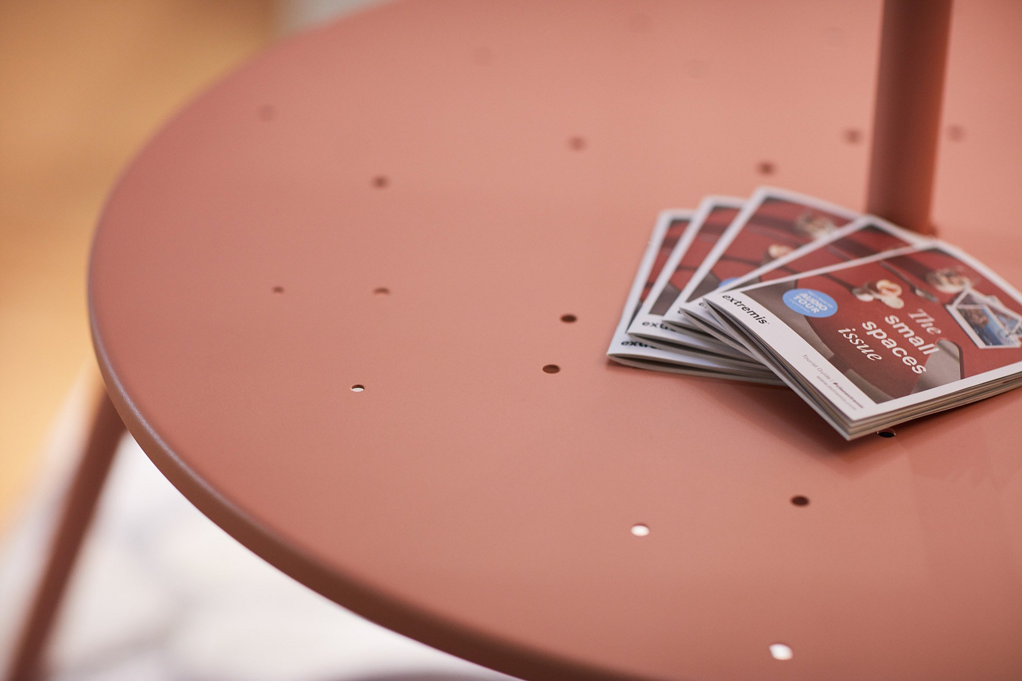 Close up of the virus table with books on top.