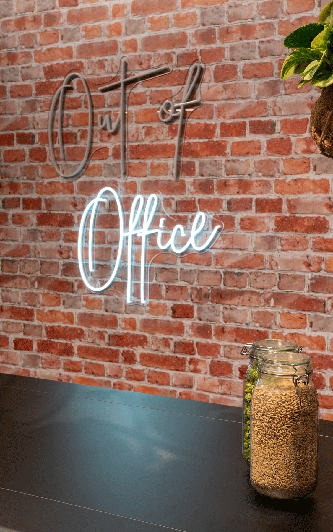 Animated hero image for the Orgatec story, showing the AMAi setup as a flexible, brewery-inspired workspace with a foaming-ideas theme.