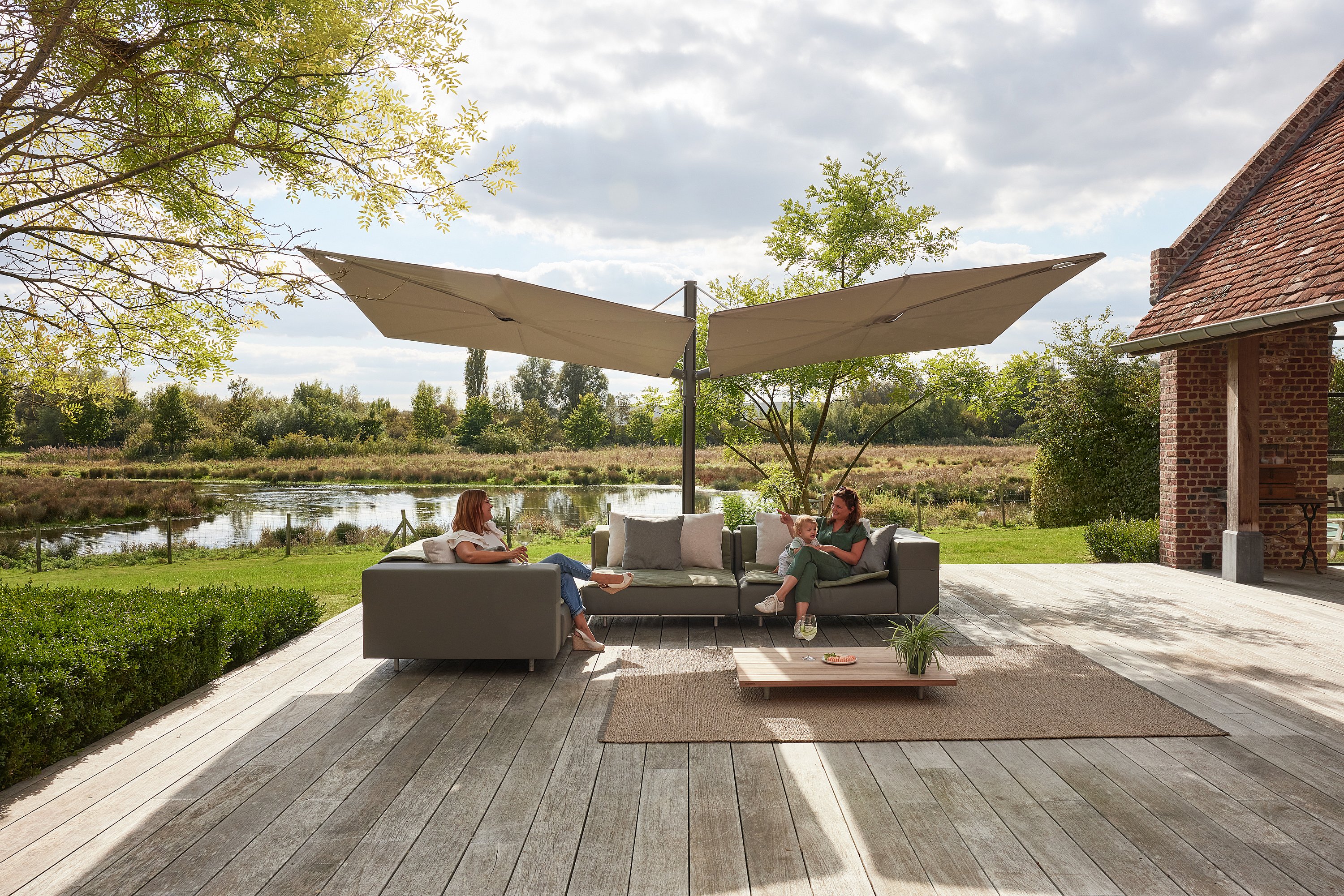 Sensu shade shown in a product overview, emphasizing its flat horizontal canopy that opens like a hand fan.