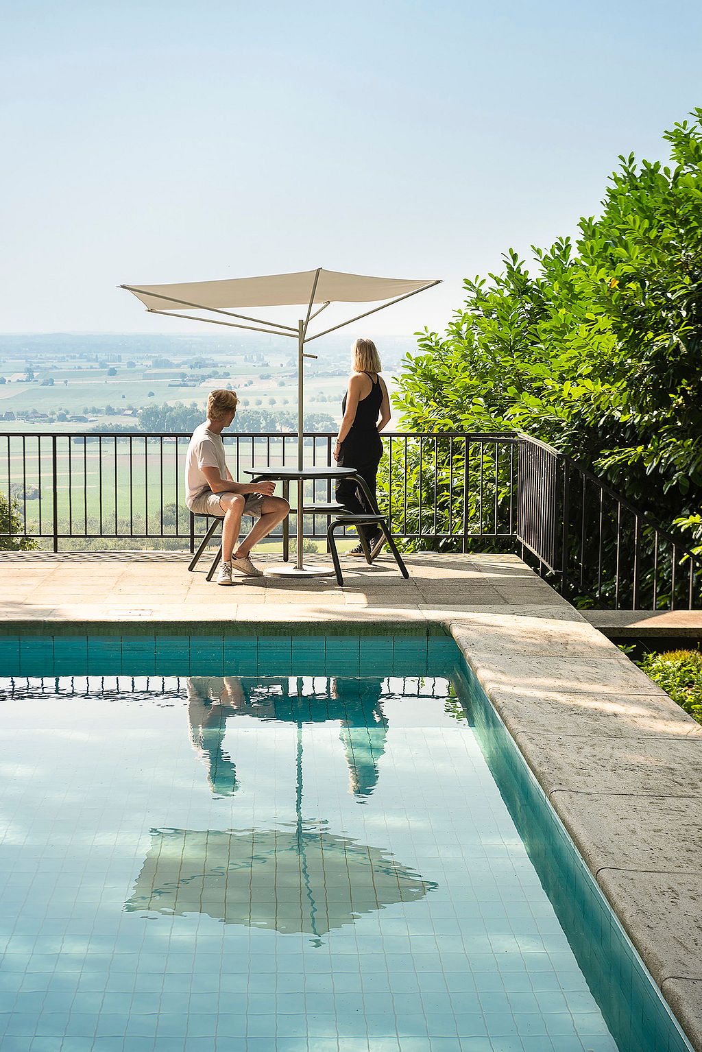 Acacia asymmetrical shade shown like a sculptural tree, with an organic canopy shape inspired by African acacias.