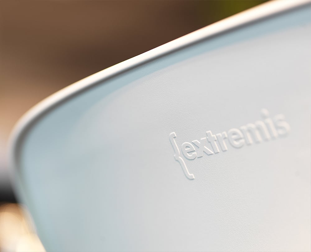 Close-up of the Captain’s Chair shell in polypropylene, highlighting the smooth molded seat surface and the material used for the chair shell.