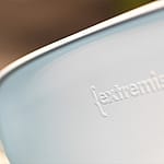 Close-up of the Captain’s Chair shell in polypropylene, highlighting the smooth molded seat surface and the material used for the chair shell.