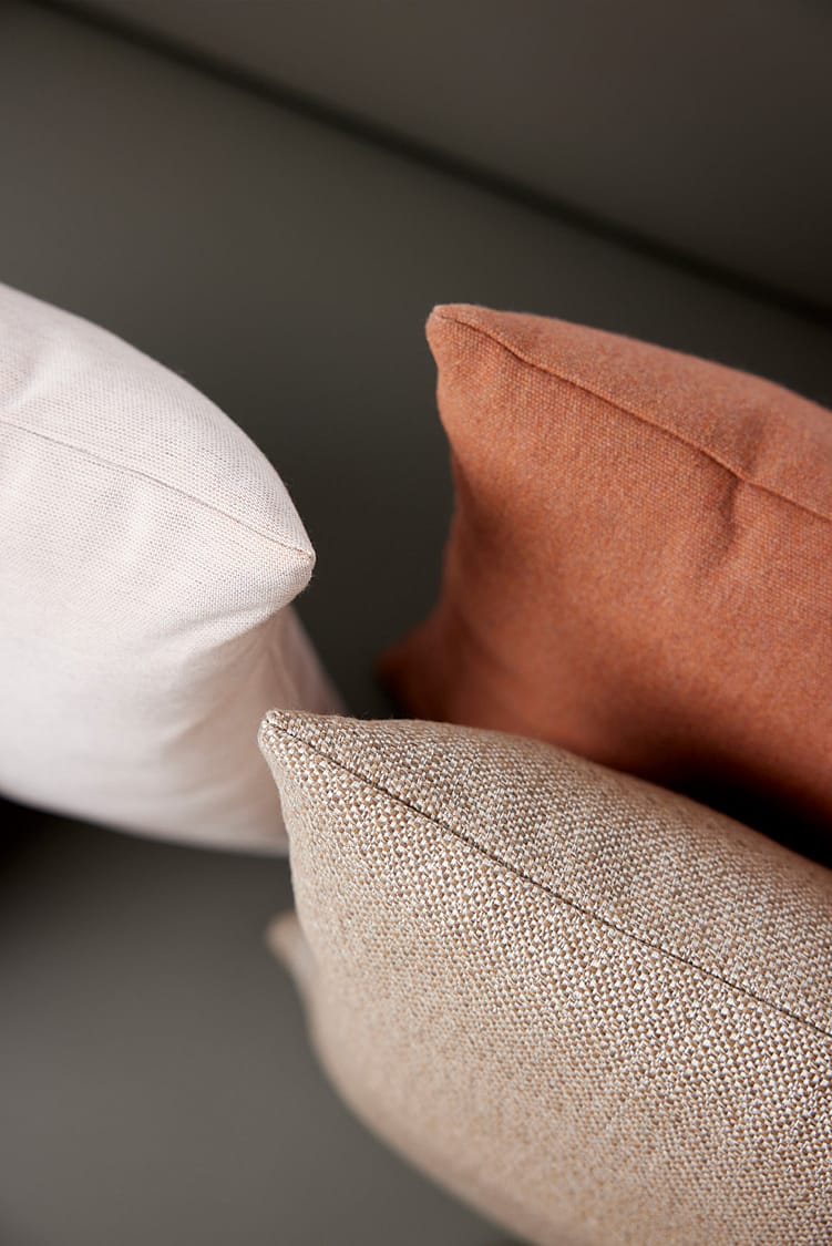 Material image representing Sunbrella acrylic outdoor fabric used for Extremis cushions.