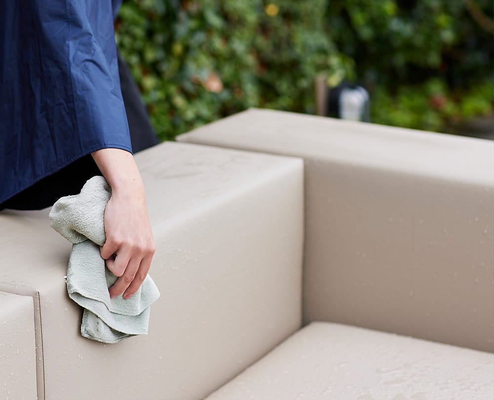 Close-up of Walrus upholstery in waterproof tarpaulin, highlighting the smooth, heavy-duty outdoor material used on the sofa.