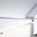 Close-up of the Sol+Luna mesh seat surface, highlighting the taut open-weave Batyline material used on the outdoor sunbed.