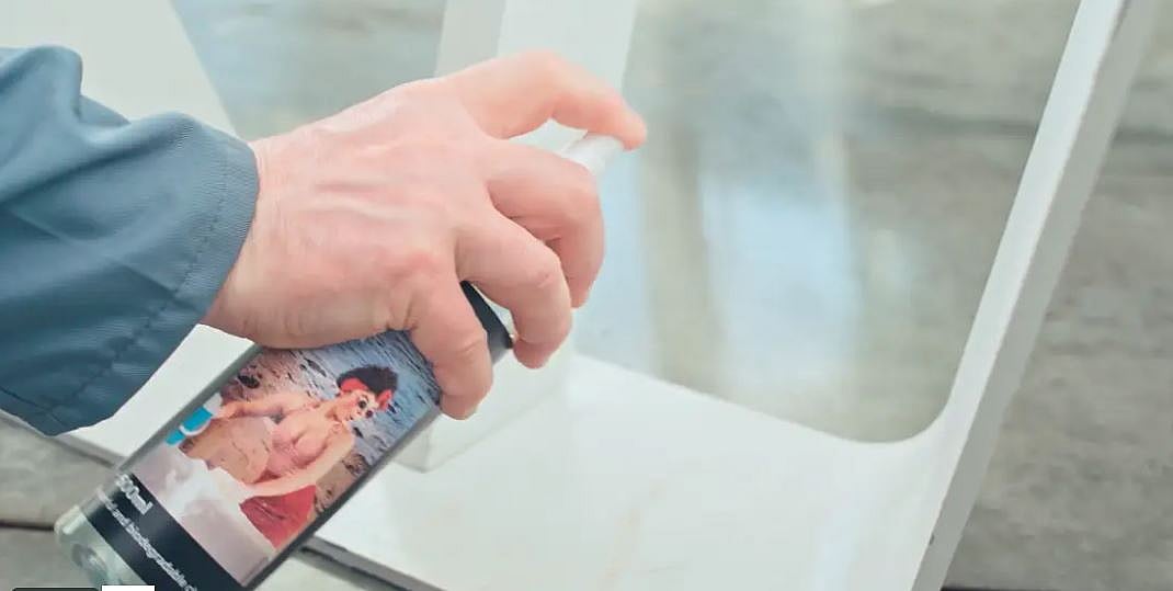 close up of cleaning a powder coated Anker