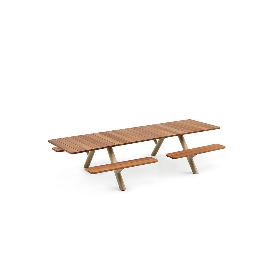 Studio-style view of the Panigiri table with long matching benches, highlighting its clean lines and aligned bench seating.