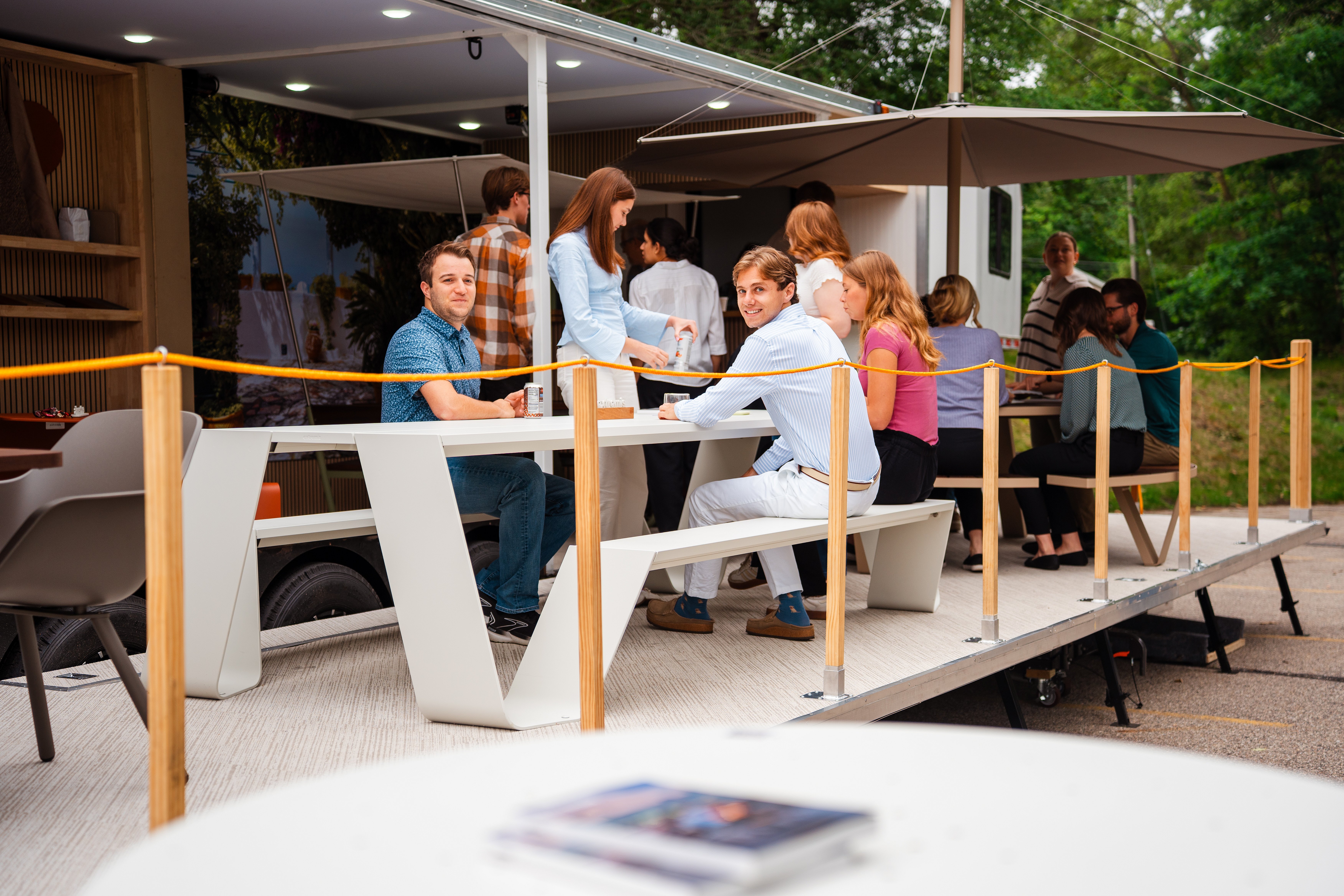 A group of people sitting at Hopper on the Tour4Togetherness