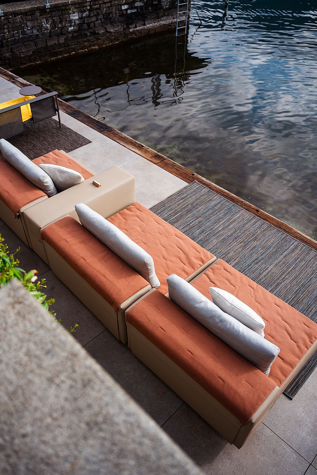 Extremis Walrus outdoor sofa running along the water’s edge at Lake Como
